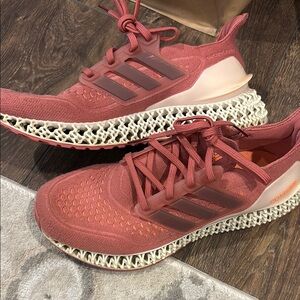 Adidas Pink Athletic Shoes with Breathable Upper and Unique Sole